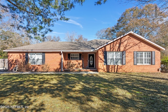 ranch-style house with a front lawn