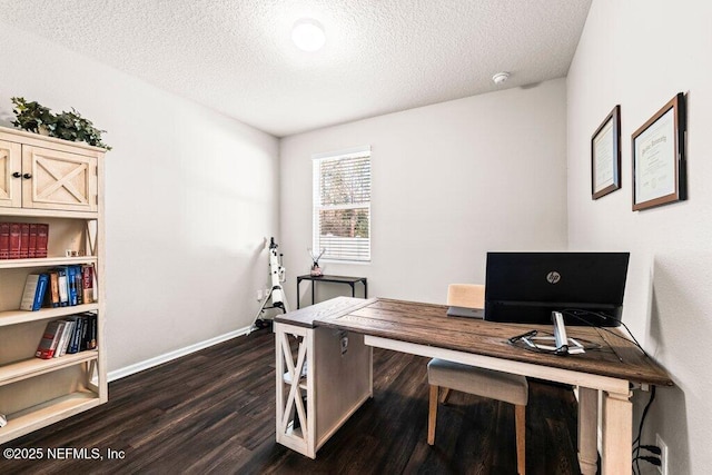 office space featuring a textured ceiling and dark hardwood / wood-style flooring