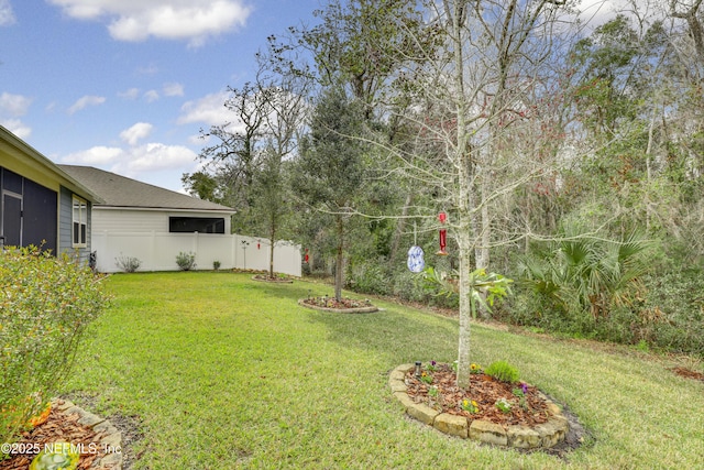 view of yard with fence