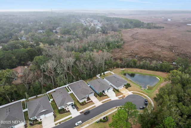 aerial view featuring a water view and a residential view