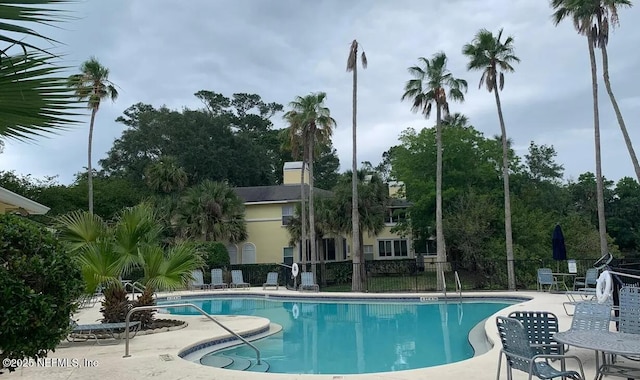 view of pool featuring a patio area