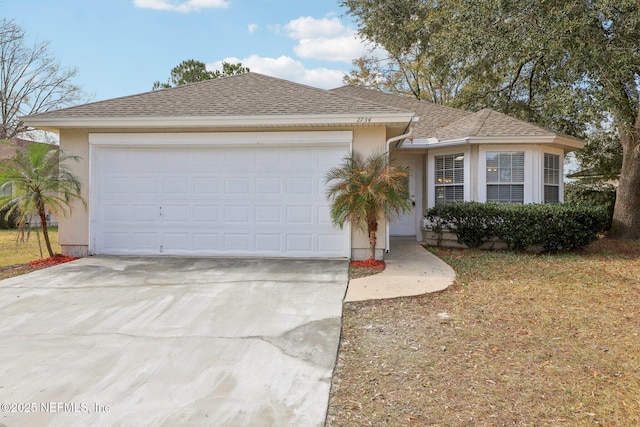 single story home with a garage