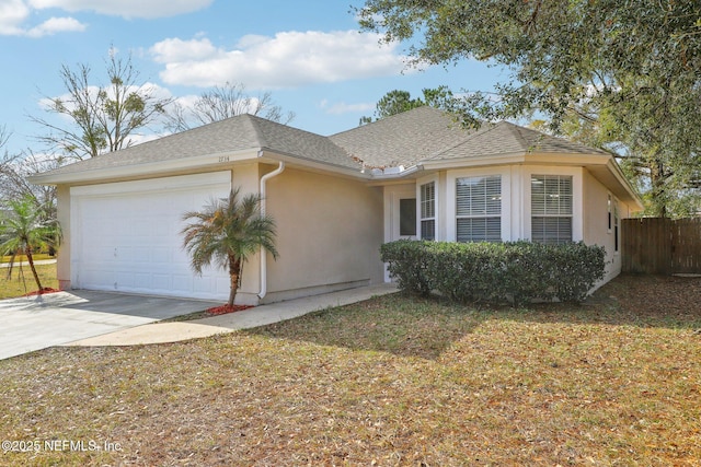 ranch-style home with a garage