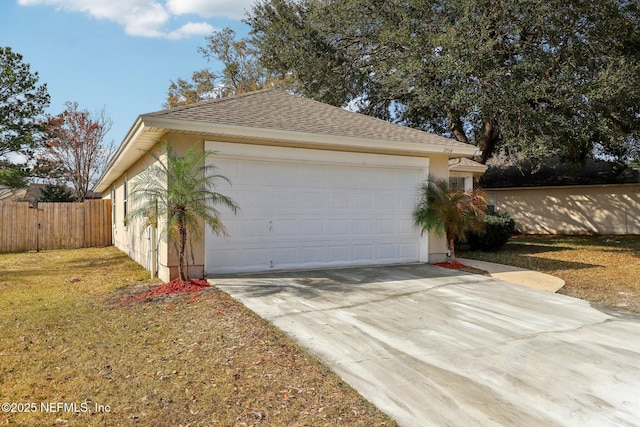 garage with a yard