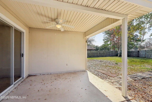 view of patio featuring ceiling fan