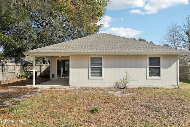 back of house with a patio area