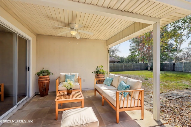 view of patio with ceiling fan and outdoor lounge area