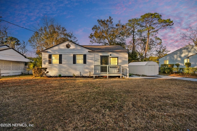 view of front of house with a lawn