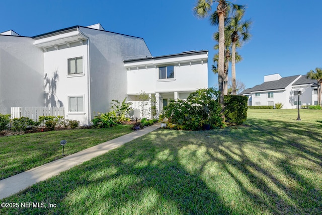 exterior space with a front lawn