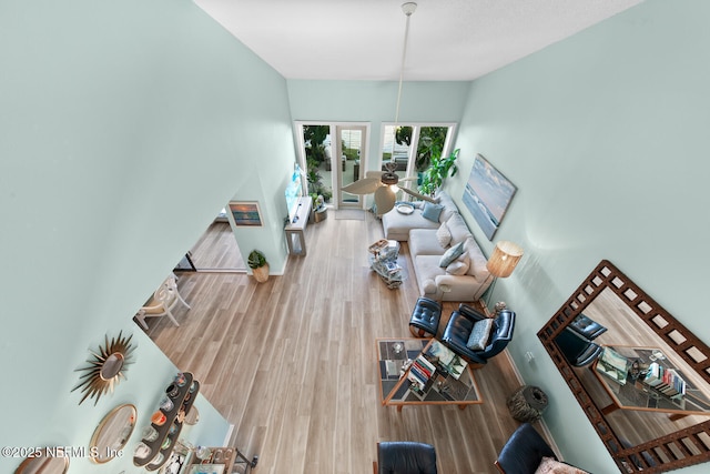 unfurnished living room with hardwood / wood-style floors