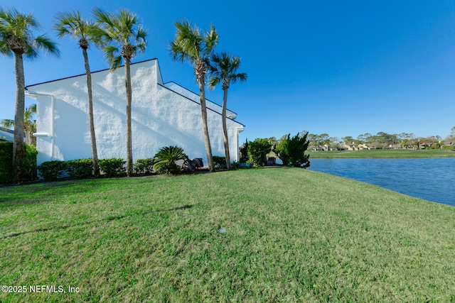 view of yard with a water view