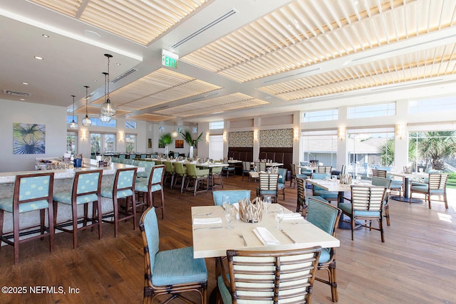 dining area with dark hardwood / wood-style flooring