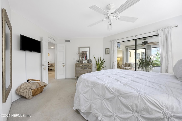 carpeted bedroom featuring access to exterior and ceiling fan