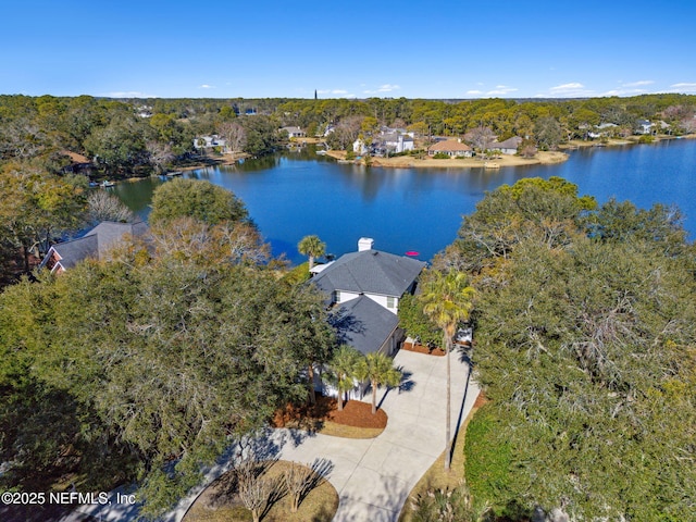 drone / aerial view with a water view