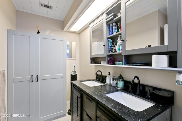 bathroom with vanity and ornamental molding