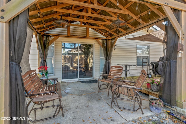 view of patio featuring a gazebo and ceiling fan