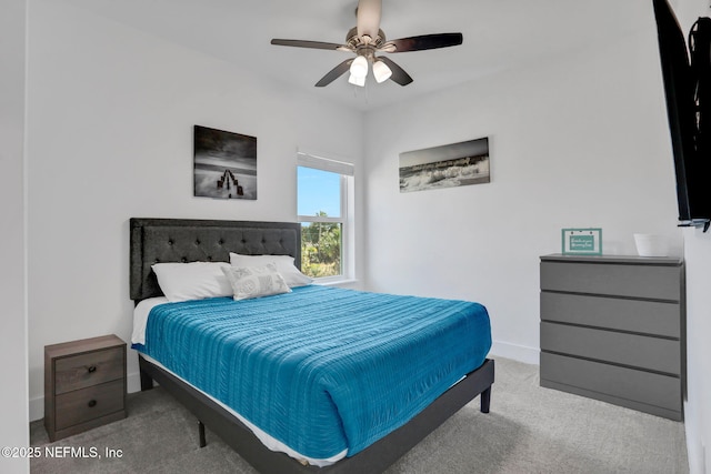 bedroom with ceiling fan and carpet