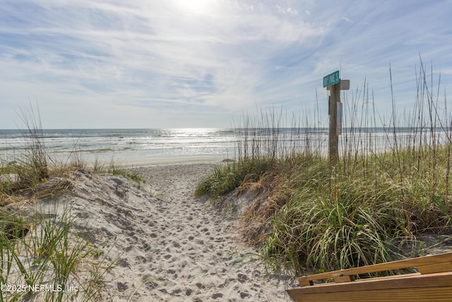 property view of water featuring a beach view