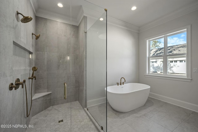 bathroom featuring ornamental molding and independent shower and bath