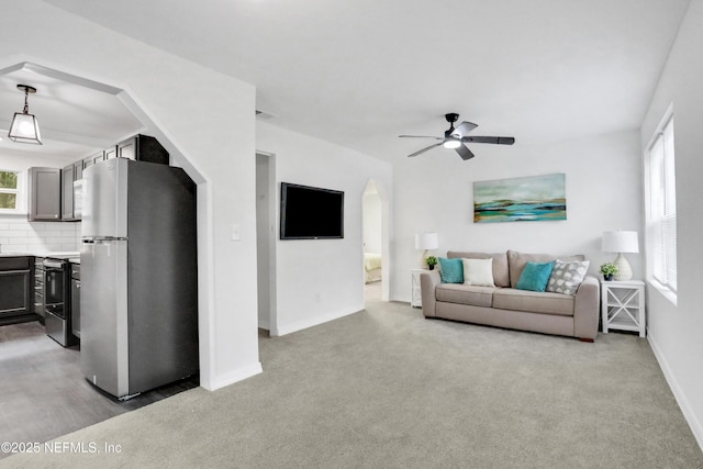 living room with ceiling fan