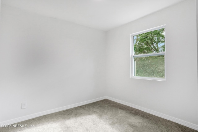 empty room featuring carpet flooring