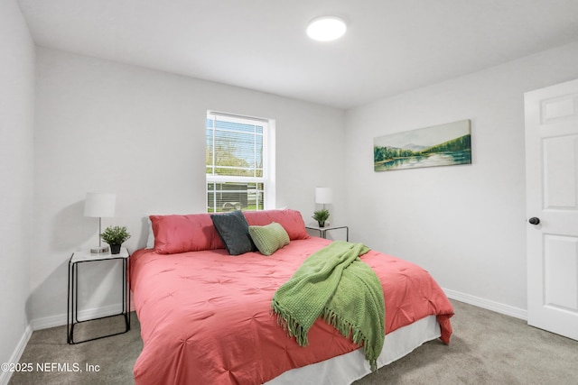 bedroom with light carpet