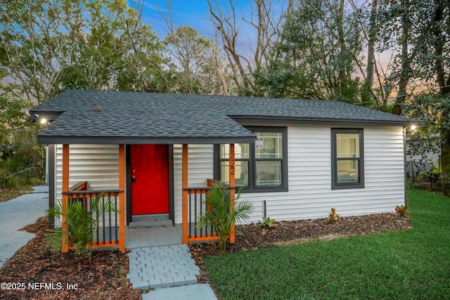 view of front of home featuring a yard