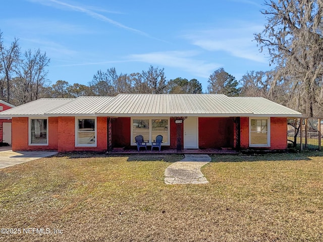 ranch-style house with a front lawn