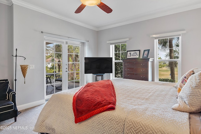 bedroom with carpet flooring, ornamental molding, access to exterior, ceiling fan, and french doors