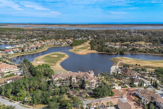 birds eye view of property featuring a water view