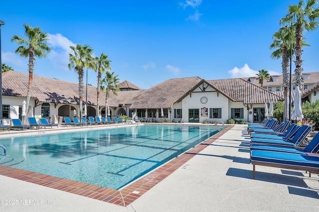 view of swimming pool featuring a patio