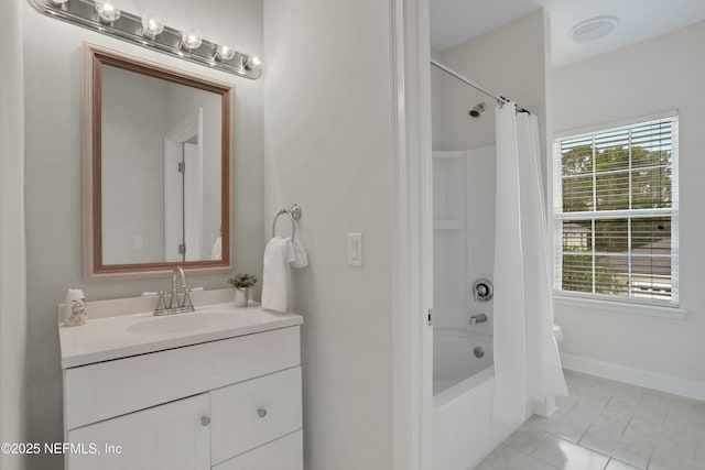 bathroom with vanity, tile patterned flooring, and shower / bath combo with shower curtain