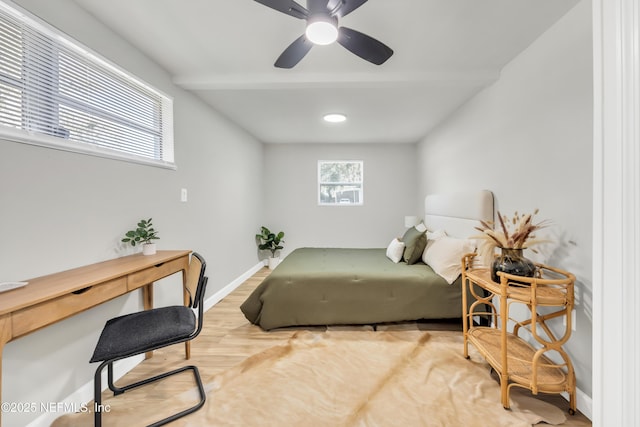 bedroom with wood-type flooring and ceiling fan