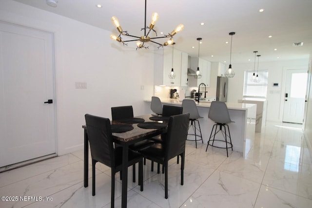 dining room featuring sink