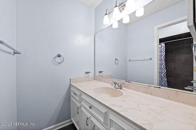 bathroom featuring vanity and a shower with curtain