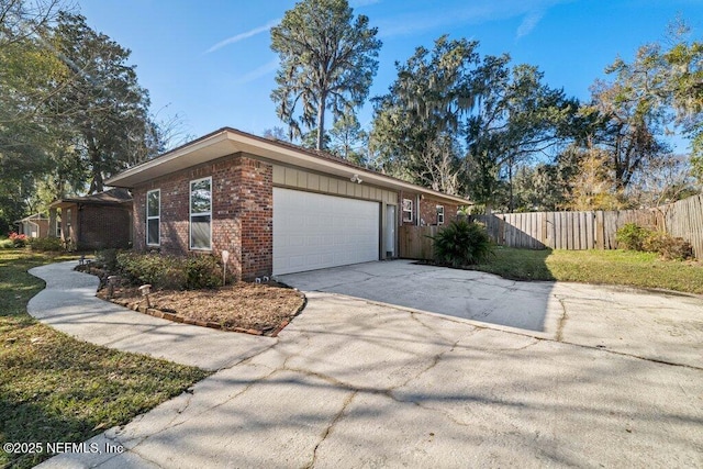 view of side of property with a garage