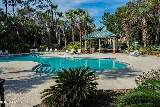 view of pool featuring a gazebo and a patio area