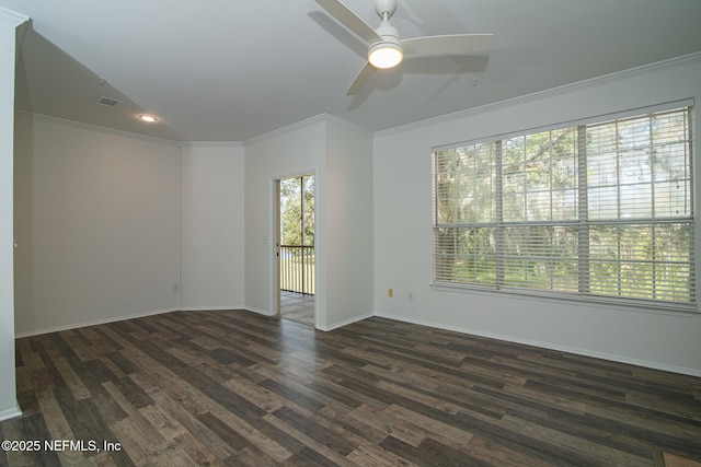 spare room with ceiling fan, ornamental molding, and dark hardwood / wood-style flooring