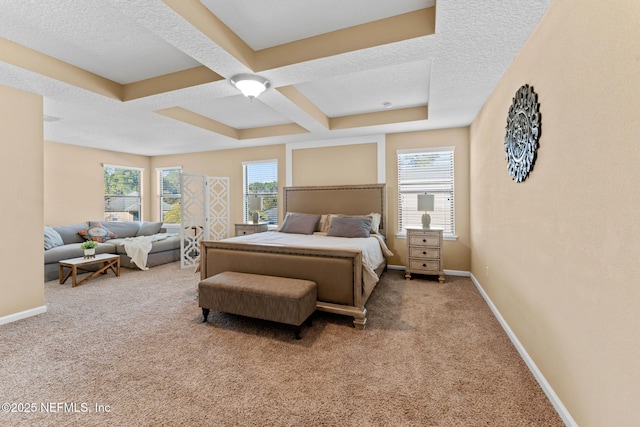 carpeted bedroom featuring coffered ceiling and a textured ceiling