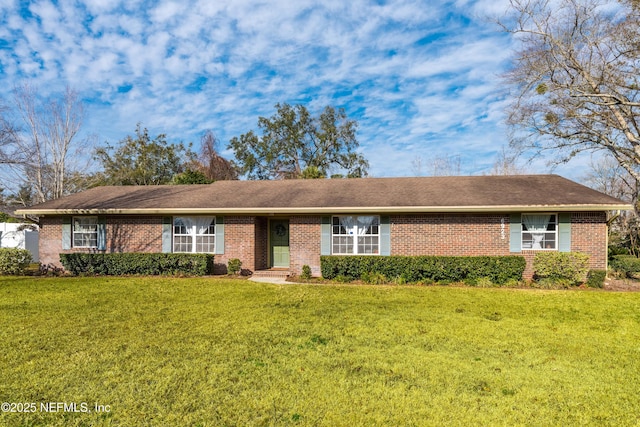 ranch-style house with a front lawn