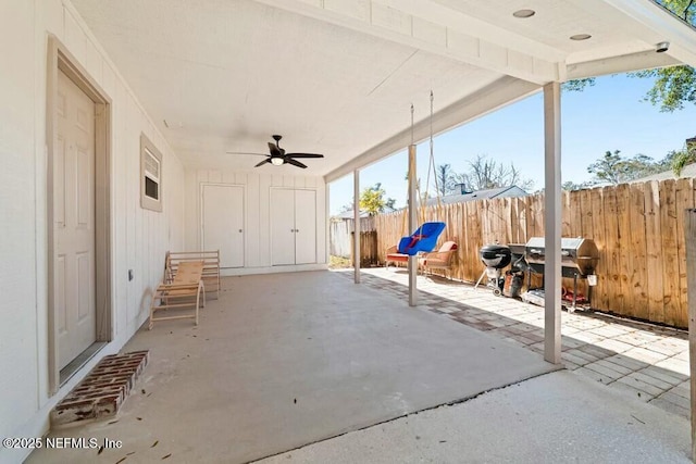 view of patio with grilling area and ceiling fan