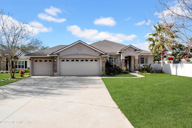 ranch-style home featuring a garage and a front lawn