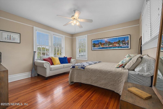 bedroom featuring hardwood / wood-style floors and ceiling fan