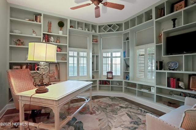 office featuring hardwood / wood-style flooring and ceiling fan