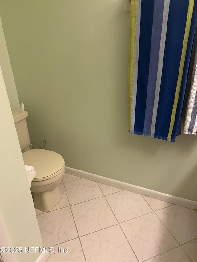 bathroom featuring toilet