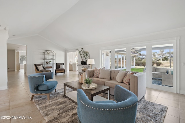 living room with light tile patterned flooring, ornamental molding, vaulted ceiling, and a wealth of natural light