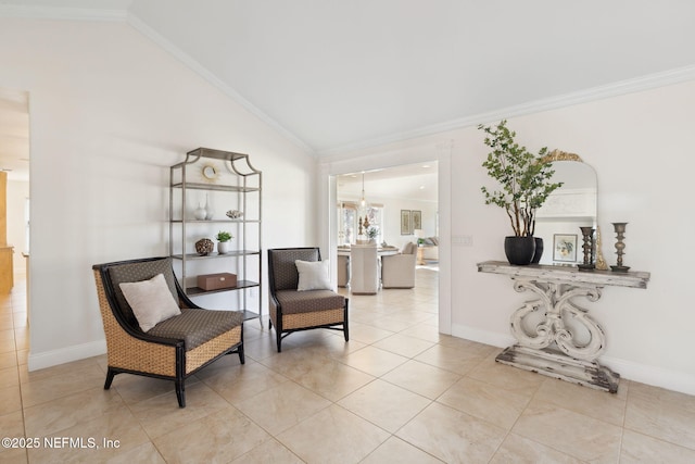 sitting room with ornamental molding, lofted ceiling, a chandelier, and light tile patterned floors