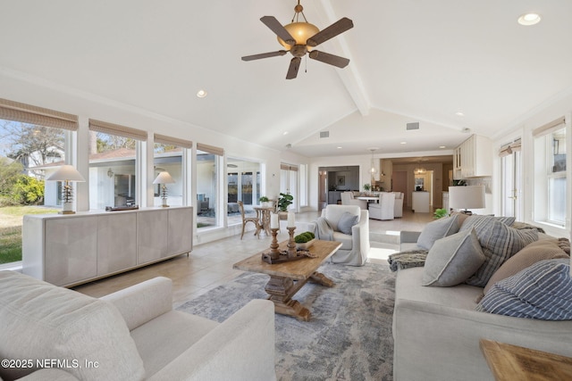 tiled living room with beam ceiling and high vaulted ceiling