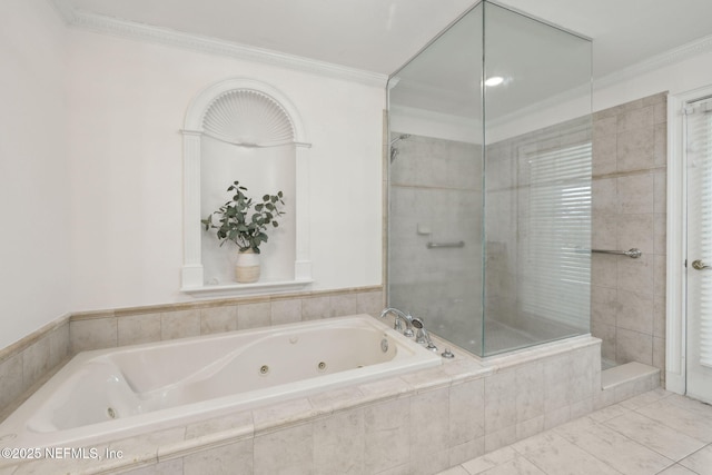 bathroom featuring crown molding and separate shower and tub