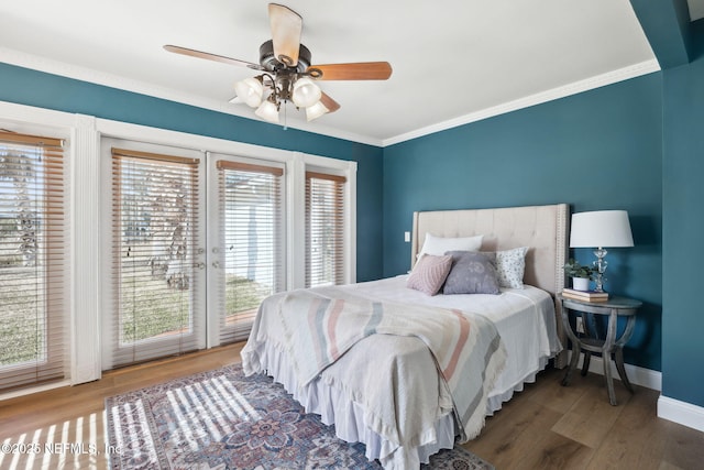 bedroom featuring ceiling fan, ornamental molding, wood-type flooring, and access to outside